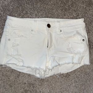 AE distressed white denim shorts